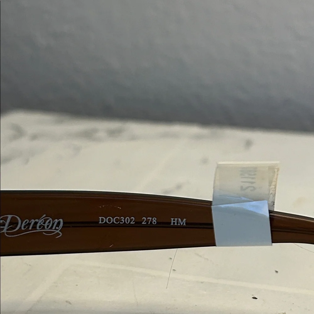 Dereon Elegant Brown With Silver Accents Women's Glasses. Size 53-17-135